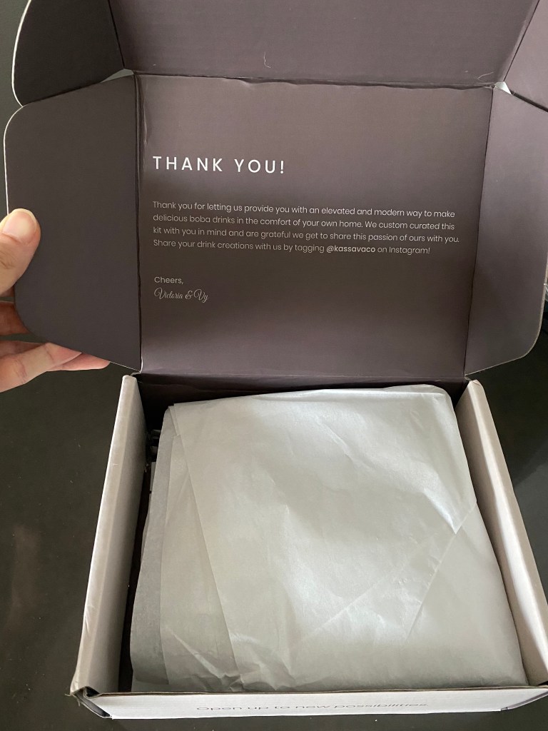 Opening the box with thank you message